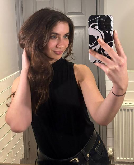 Woman taking a selfie.