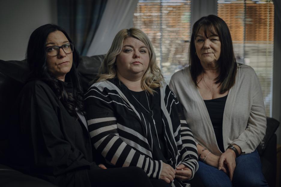 Three women sitting together.