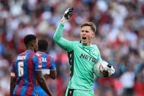 Dean Henderson of Crystal Palace celebrates saving a penalty.