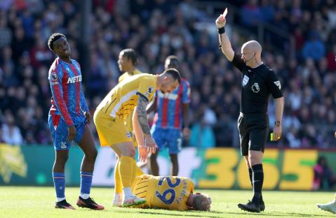 Eddie Nketiah of Crystal Palace receives a red card during a Premier League match.