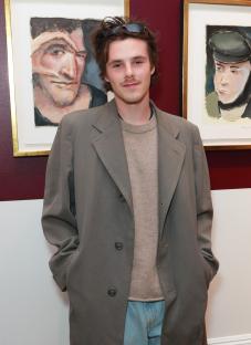 Cruz Beckham at a Bob Dylan art exhibition.