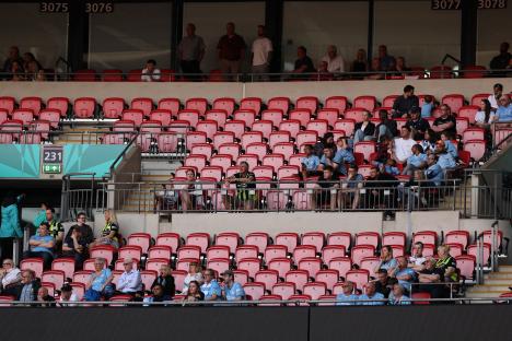 Manchester City fans at a soccer match.