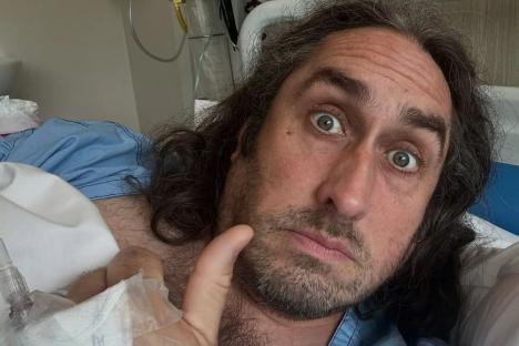 Top comedian cancels string of shows after medical emergency as he posts from hospital bed