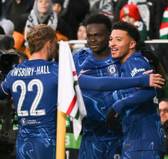 Chelsea players celebrating a goal.