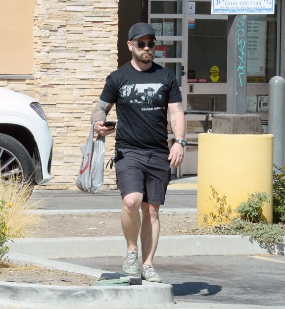 Jack Osbourne wearing a Black Sabbath t-shirt.