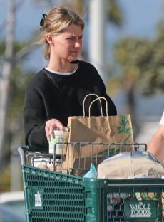 Briana Jungwirth shopping at Whole Foods with her son.