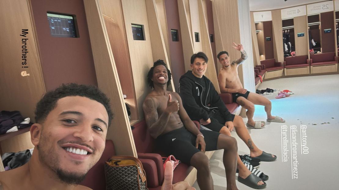Sancho, Malacia, Martinez, and Antony in the Manchester United dressing room.