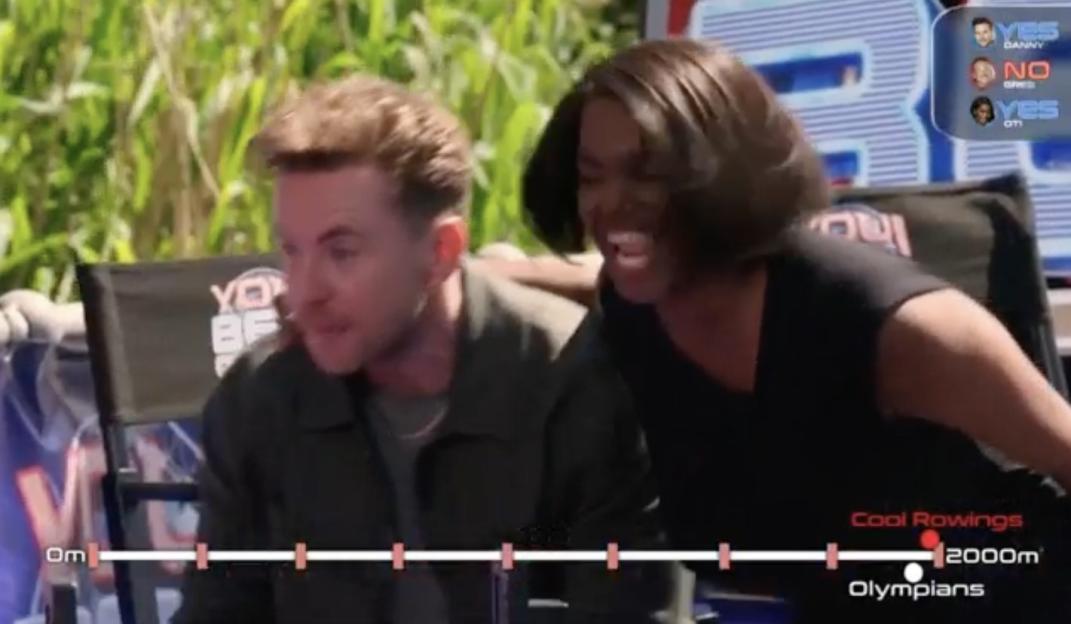 Screenshot from ITV's You Bet on Tour showing Oti Mabuse and a male contestant reacting to a race.