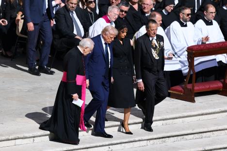 Donald and Melania Trump at a papal funeral.