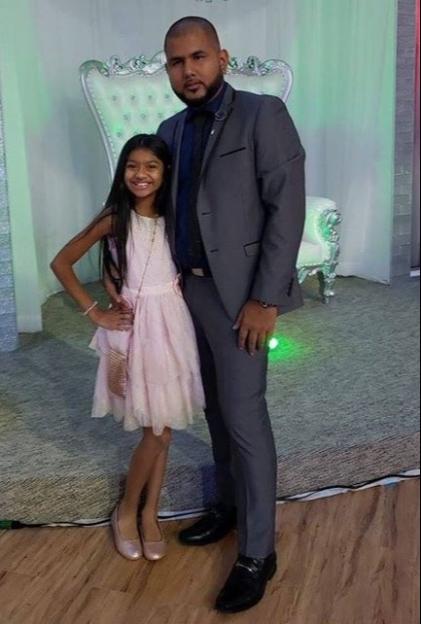 Photo of Roopesh Rajkumar and his daughter Riya.