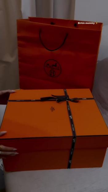 Hermes Birkin bag in its box and shopping bag.