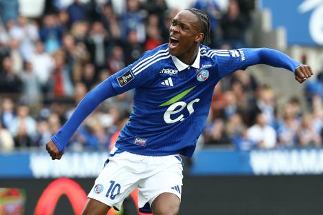 Emanuel Emegha, #10, celebrating during a soccer match.
