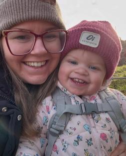 A mother and her toddler daughter.