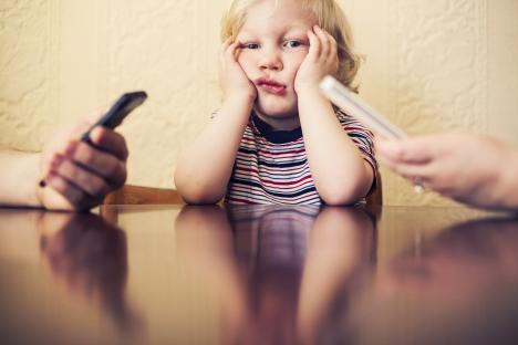 Ten worrying signs you’re putting your phone before your child – and how your screen obsession affects your kids