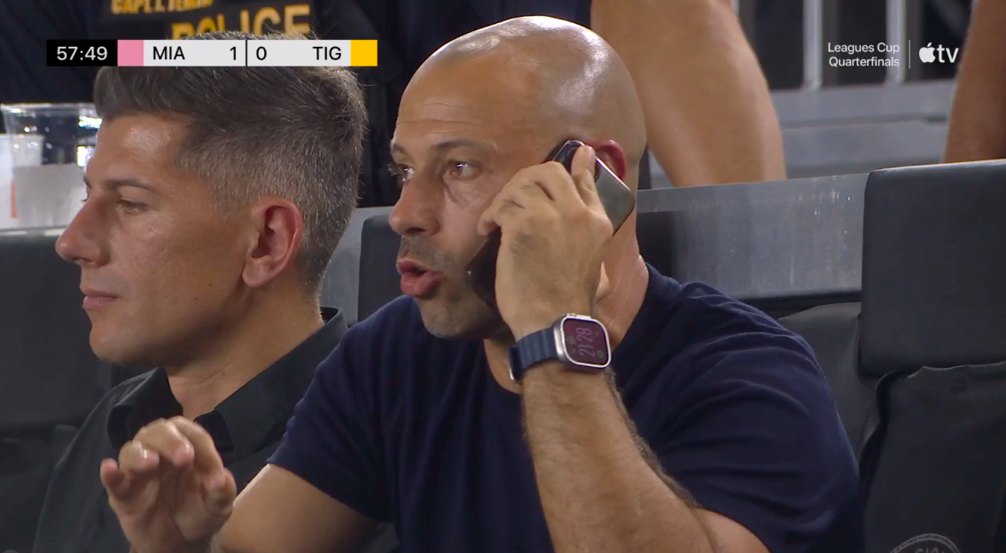 Screenshot of a man on a phone call during a Leagues Cup quarterfinal match.