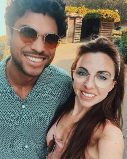 Selfie of a couple smiling.