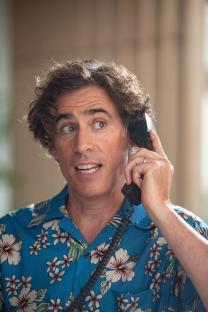 Stephen Mangan on the phone during filming of The Fortune Hotel.