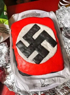Cake decorated with a swastika.
