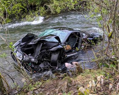 Brit couple dies after £300,000 Ferrari careers off mountain highway and plunges into river during rally in Spain