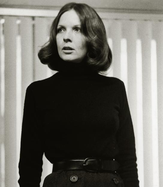 Diane Keaton in 'The Godfather Part II,' wearing a dark turtleneck and looking to her left.