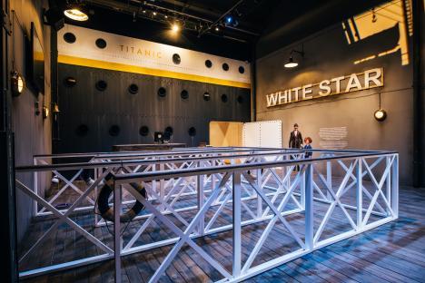 Titanic exhibition interior with White Star Line signage.