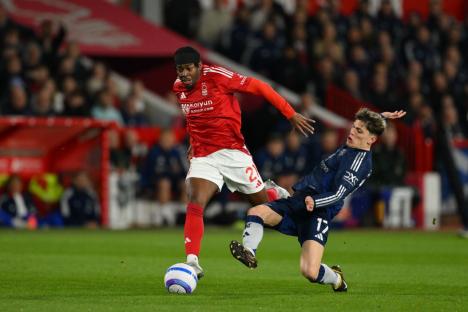 RESTRICTED TO EDITORIAL USE. No use with unauthorized audio, video, data, fixture lists, club/league logos or 'live' services. Online in-match use limited to 120 images, no video emulation. No use in betting, games or single club/league/player publications Mandatory Credit: Photo by MI News/NurPhoto/REX/Shutterstock (15233615en) Anthony Elanga of Nottingham Forest runs with the ball under pressure from Alejandro Garnacho of Manchester United before scoring a goal during the Premier League match between Nottingham Forest and Manchester United at the City Ground in Nottingham, United Kingdom, on April 1, 2025. Nottingham Forest FC v Manchester United FC - Premier League, United Kingdom - 01 Apr 2025