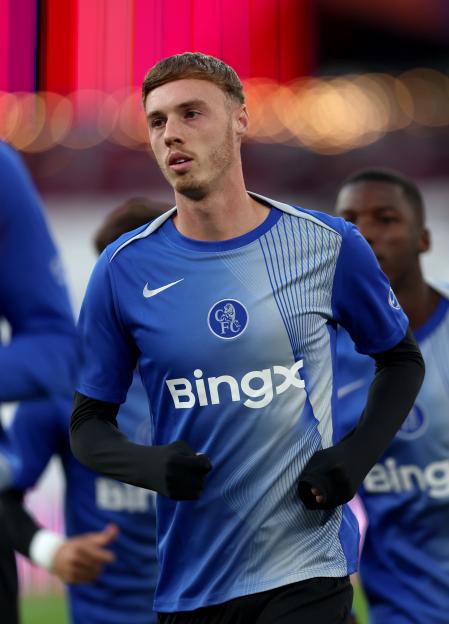 Cole Palmer of Chelsea warming up before a Premier League match.