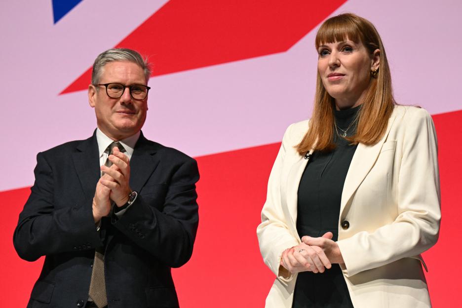 Keir Starmer applauds Angela Rayner.