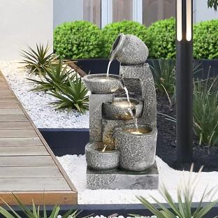 Grey Cascade solar-powered resin water fountain with LED light.