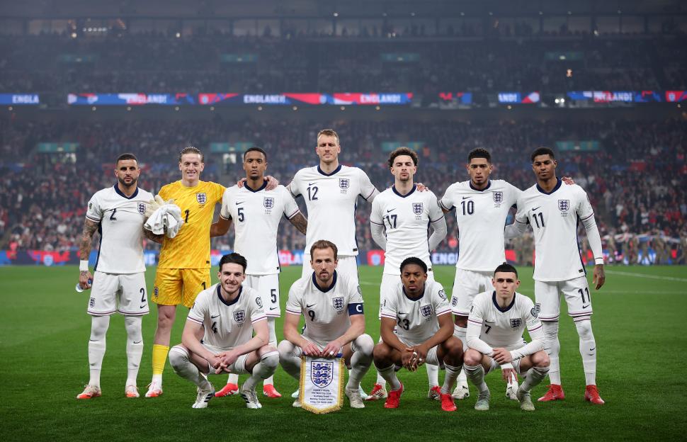 Myles Lewis-Skelly and Dan Burn of England's national football team.