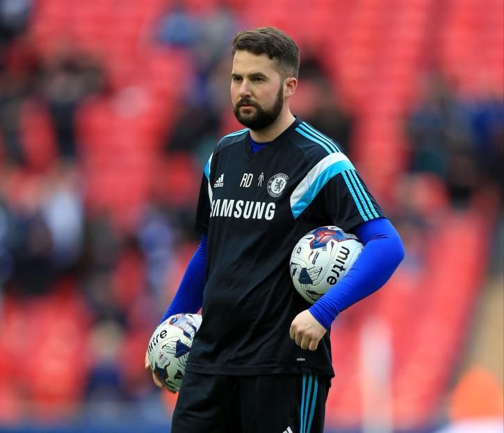 Chelsea ball boy holding soccer balls.