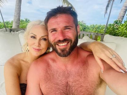 Kristina Rihanoff and Ben cuddling on a tropical vacation.