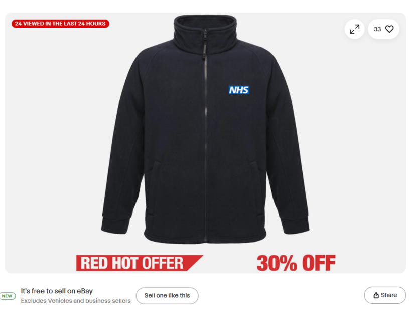 Black jacket with NHS logo.