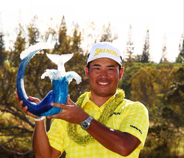 Hideki Matsuyama poses with the Sentry Tournament of Champions trophy.