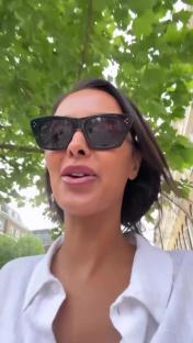 Maya Jama speaking outdoors.