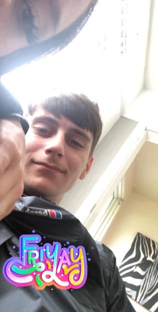 Dylan Keelan and Nicole Wardle looking up at the camera.