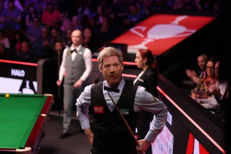 Neil Robertson of Australia reacts during a snooker match.