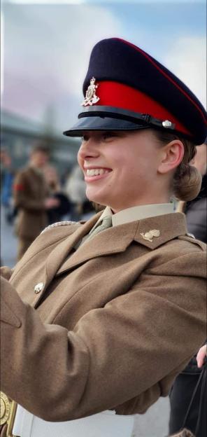 Royal Artillery Gunner Jaysley Beck smiling at her passing out parade.