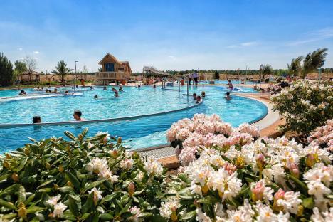 Tropical Islands Resort Berlin pool with people swimming.