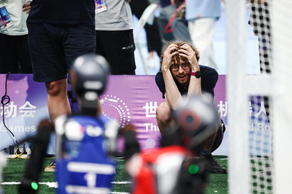 Contestant reacting during the World Humanoid Robot Games.