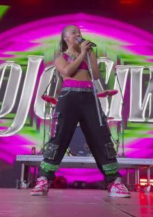 JoJo Siwa performing on stage.