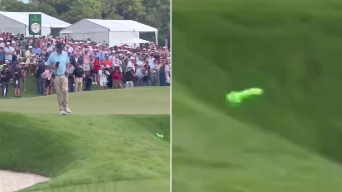 Bizarre scenes as bright green sex toy thrown on 18th green at PGA FedEx Cup as angry star boots it into bunker
