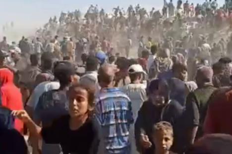 Shocking moment thousands of Gazans overrun US-backed aid site hours after it opens as ‘shots fired to disperse crowd’