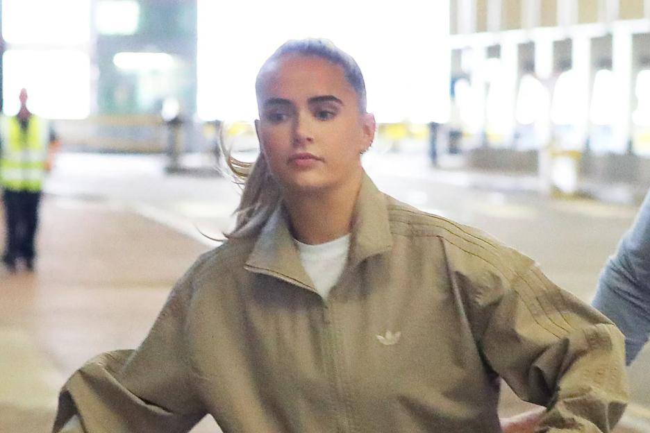 Molly Mae can’t raise a smile as she jets off on holiday with Tommy after moaning ‘not doing one fun thing’ in summer