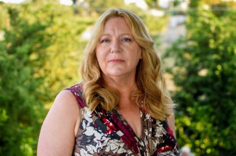 Portrait of Carole Horlock, the world's most prolific surrogate.