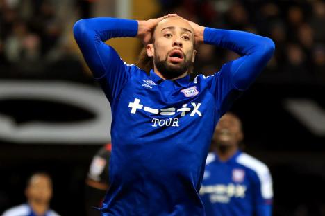 IPSWICH, ENGLAND - DECEMBER 29: Marcus Harness of Ipswich Town reacts after missing a shot during the Sky Bet Championship match between Ipswich Town and Queens Park Rangers at Portman Road on December 29, 2023 in Ipswich, England. (Photo by Stephen Pond/Getty Images)