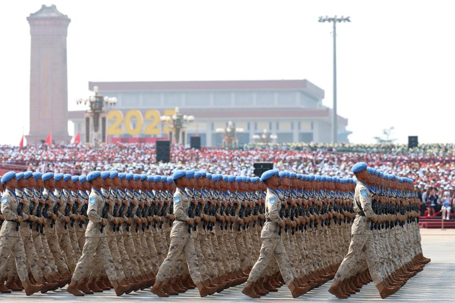 Soldiers marching in Tiananmen Square during a military parade.