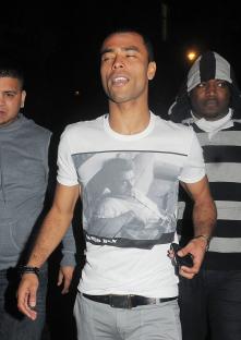 Ashley Cole and other Chelsea players leaving a nightclub.