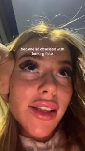 Close-up of a woman with long false eyelashes, saying