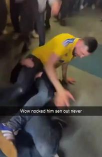 Video of a fight between two people at a Leeds sporting event.